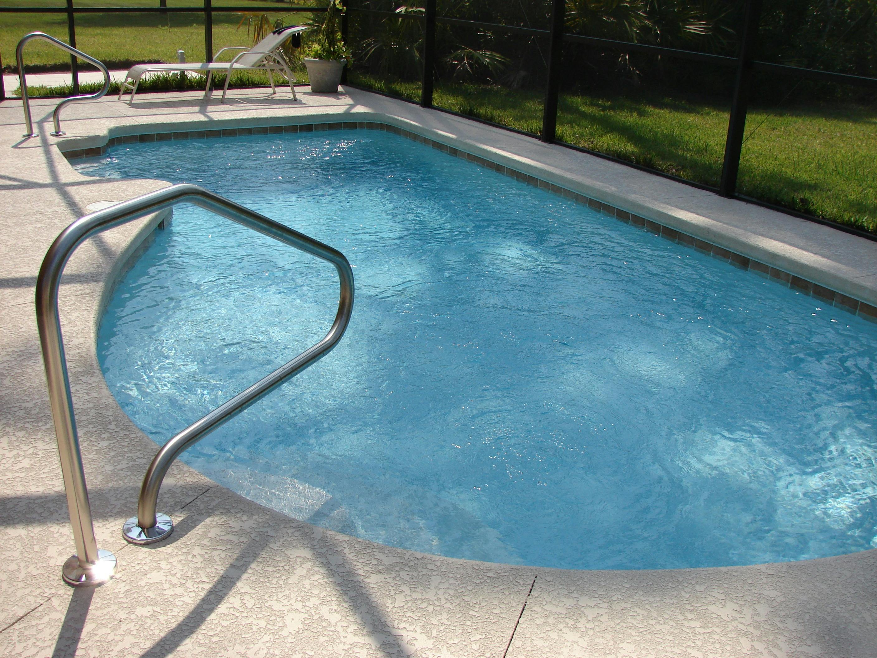 Swimming pool edge and water surface